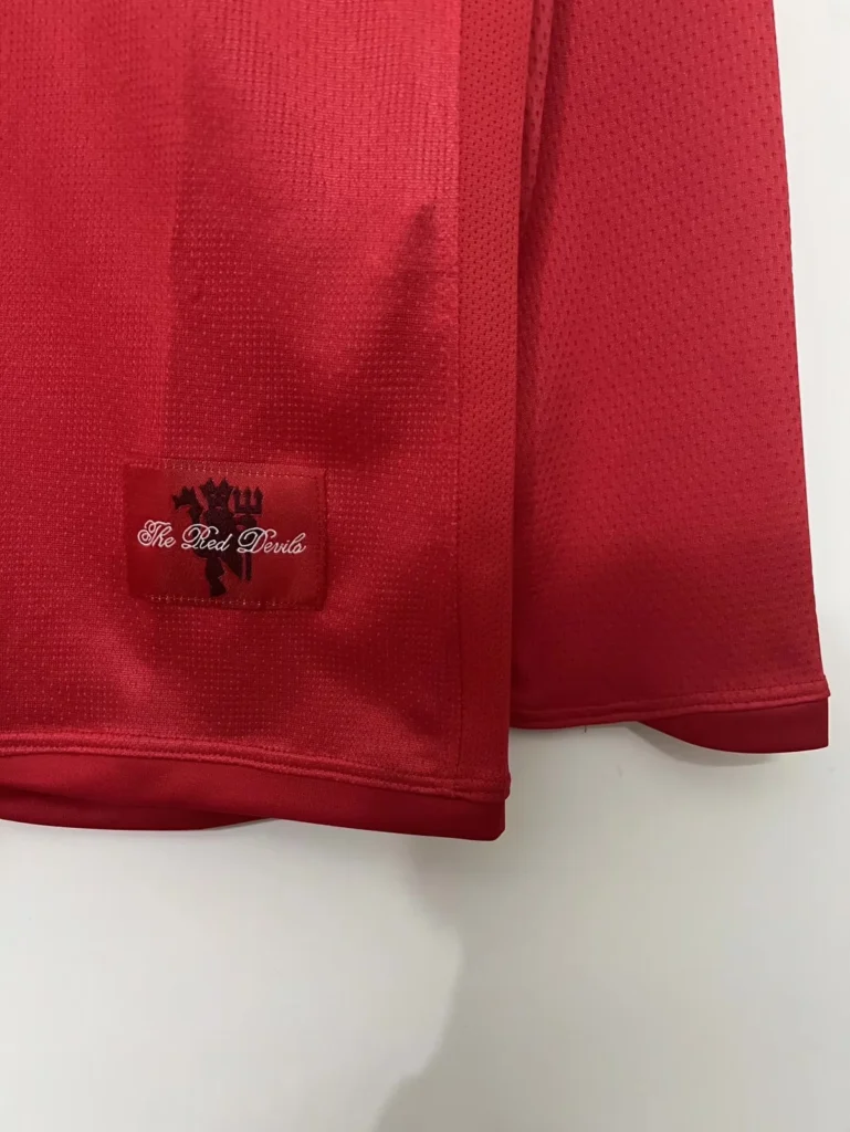 mdo mun aig red long sleeve 05 hem label detail